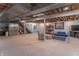 Large finished basement with carpet floors and access to the upper level via staircase at 6530 Grant Wood Ct, Indianapolis, IN 46256