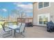 Backyard deck with seating area, table, and hot tub at 6530 Grant Wood Ct, Indianapolis, IN 46256