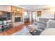 Inviting living room with brick fireplace, plush seating, and neutral decor at 6530 Grant Wood Ct, Indianapolis, IN 46256