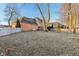 Spacious fenced backyard with a large lawn and mature trees at 6878 Black Oak East Ct, Avon, IN 46123