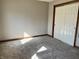 Cozy bedroom with carpet and a closet, ready to be customized to your liking at 6878 Black Oak East Ct, Avon, IN 46123