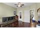 Bright office space with modern desk setup, wood floors, and ample storage at 700 Greenford N Trl, Carmel, IN 46032