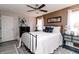 Bedroom with a large bed, dresser, and neutral walls at 7221 Broyles Ln, Indianapolis, IN 46217
