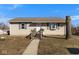 Charming one-story home with a walkway leading to the front door, offering a warm and inviting curb appeal at 817 Hamilton St, Lebanon, IN 46052