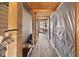 Long wooden hallway with open and covered areas, enhancing the home's outdoor connection and function at 817 Hamilton St, Lebanon, IN 46052