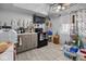 Well-organized kitchen with tile flooring, sleek appliances, and efficient storage solutions at 817 Hamilton St, Lebanon, IN 46052