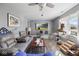 Bright living room with large screen television and hardwood floors, perfect for entertainment and relaxation at 817 Hamilton St, Lebanon, IN 46052