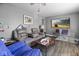 Inviting living room featuring cozy gray walls, entertainment system, and comfortable seating, a perfect relaxation spot at 817 Hamilton St, Lebanon, IN 46052