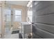 Bathroom with tub and shower combination, modern vanity, and stylish hexagon tile floor at 8401 N College Ave, Indianapolis, IN 46240