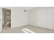 Spare bedroom with a double door closet and an open doorway at 897 Copperwood Dr, Carmel, IN 46033