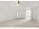 Bright and airy bedroom with ensuite bathroom and multiple doors at 897 Copperwood Dr, Carmel, IN 46033
