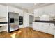 Bright kitchen with stainless steel fridge and ample counter space at 897 Copperwood Dr, Carmel, IN 46033
