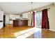 Spacious kitchen and dining area featuring hardwood floors and abundant natural light at 897 Copperwood Dr, Carmel, IN 46033