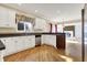 Well-equipped kitchen with white cabinets and stainless steel appliances at 897 Copperwood Dr, Carmel, IN 46033