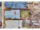 This aerial view showcases the property's layout and boundaries, highlighting its position within the neighborhood at 912 Harlan St, Indianapolis, IN 46203