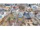 Birds-eye-view showcases houses with diverse architectural styles, surrounded by lush, mature trees and landscaped yards at 912 Harlan St, Indianapolis, IN 46203