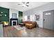 Living Room featuring hardwood floors, a decorative fireplace, and plenty of light at 912 Harlan St, Indianapolis, IN 46203