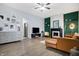 Living Room features wood flooring, fireplace and modern decorations at 912 Harlan St, Indianapolis, IN 46203