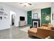 Inviting living room with a fireplace, plush leather sofa, and stylish decor at 912 Harlan St, Indianapolis, IN 46203