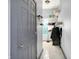 Spacious walk-in closet with shelves, hanging racks, and window to provide natural light at 912 Harlan St, Indianapolis, IN 46203