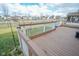 Inviting back deck with great pond views and a well-manicured backyard and firepit at 10708 Inspiration Dr, Indianapolis, IN 46259