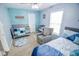 Light and airy Bedroom with a crib, plush chair, and soothing color scheme, perfect for a growing Gathering at 10708 Inspiration Dr, Indianapolis, IN 46259