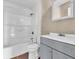 Cozy bathroom features a shower-tub combo and single sink vanity with modern fixtures at 10830 Clear Spring Dr, Camby, IN 46113