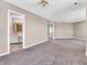 Large bedroom with a view of the en-suite bathroom at 10830 Clear Spring Dr, Camby, IN 46113