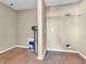 Laundry room with tile floors and plenty of storage space at 10830 Clear Spring Dr, Camby, IN 46113