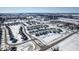 Aerial view of a neighborhood featuring single-Gathering homes, streets and a nearby elementary school at 10865 Mystic View Ct, Indianapolis, IN 46239