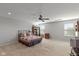 Large bedroom with carpet, ceiling fan, windows and spacious layout at 10865 Mystic View Ct, Indianapolis, IN 46239