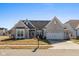Charming single-Gathering home with well-maintained lawn and attached two-car garage at 10865 Mystic View Ct, Indianapolis, IN 46239