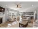 Spacious living room open to the kitchen and dining area, with lots of natural light at 10865 Mystic View Ct, Indianapolis, IN 46239