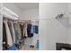 Spacious walk-in closet with shelving, hanging racks, and carpeted floor at 10865 Mystic View Ct, Indianapolis, IN 46239