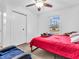 Bedroom features a bed, window, and closet at 12386 S Hillview Dr, Columbus, IN 47201