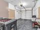Spacious garage with a foosball table and ample storage space at 12386 S Hillview Dr, Columbus, IN 47201