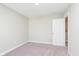 Simple bedroom with neutral carpet, one window, and a doorway for easy access at 1257 Newton St, Avon, IN 46123