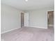 Spacious bedroom with plush carpeting, ample natural light, and access to an en-suite bathroom at 1257 Newton St, Avon, IN 46123