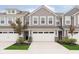 Charming townhouse with a two-car garage and well-maintained landscaping at 1257 Newton St, Avon, IN 46123