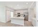 Stylish kitchen with white cabinetry, a center island, and stainless steel appliances at 1257 Newton St, Avon, IN 46123