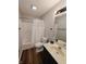 Full bathroom with tub, shower, new toilet and sink with updated lighting at 1282 Highpointe Blvd, Shelbyville, IN 46176