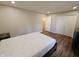 Neutral bedroom with hardwood floors, double closet and a bedside table at 1282 Highpointe Blvd, Shelbyville, IN 46176