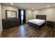 Spacious bedroom featuring a large window, dresser and bedside table at 1282 Highpointe Blvd, Shelbyville, IN 46176