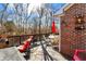 Inviting back deck with outdoor furniture and wooded view, perfect for entertaining and relaxation at 1307 Estuary Dr, Indianapolis, IN 46217