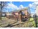 Exterior view showcasing the expansive wooden deck, perfect for outdoor gatherings in the fenced backyard at 1307 Estuary Dr, Indianapolis, IN 46217