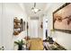Inviting foyer with a decorative light fixture, a console table, and a decorative mirror enhance the space at 1307 Estuary Dr, Indianapolis, IN 46217