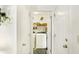 Bright laundry room with modern appliances, shelving for storage, and convenient layout at 1307 Estuary Dr, Indianapolis, IN 46217