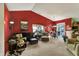 Bright living room with a comfortable black sofa and stylish decor, offering a welcoming and relaxing atmosphere at 1307 Estuary Dr, Indianapolis, IN 46217