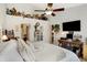 Airy main bedroom with a ceiling fan, a TV, and ample closet space at 1307 Estuary Dr, Indianapolis, IN 46217