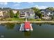 Aerial view showing home with a lake and boat dock, perfect for enjoying water activities at 13499 Marjac Way, Fishers, IN 46055